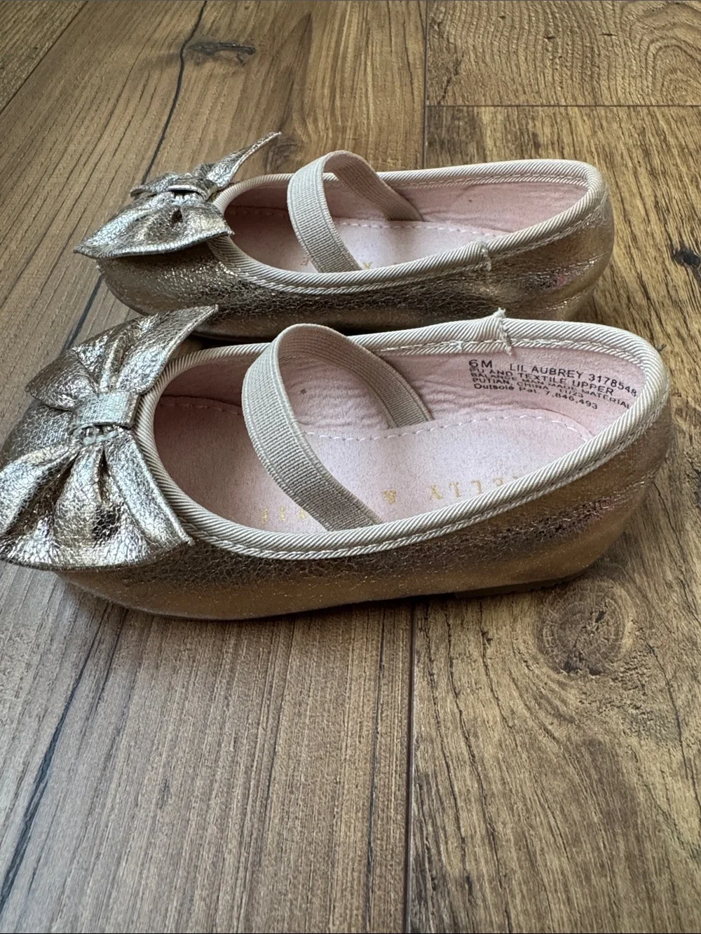 Kelly and Katie toddler gold flats, size 6